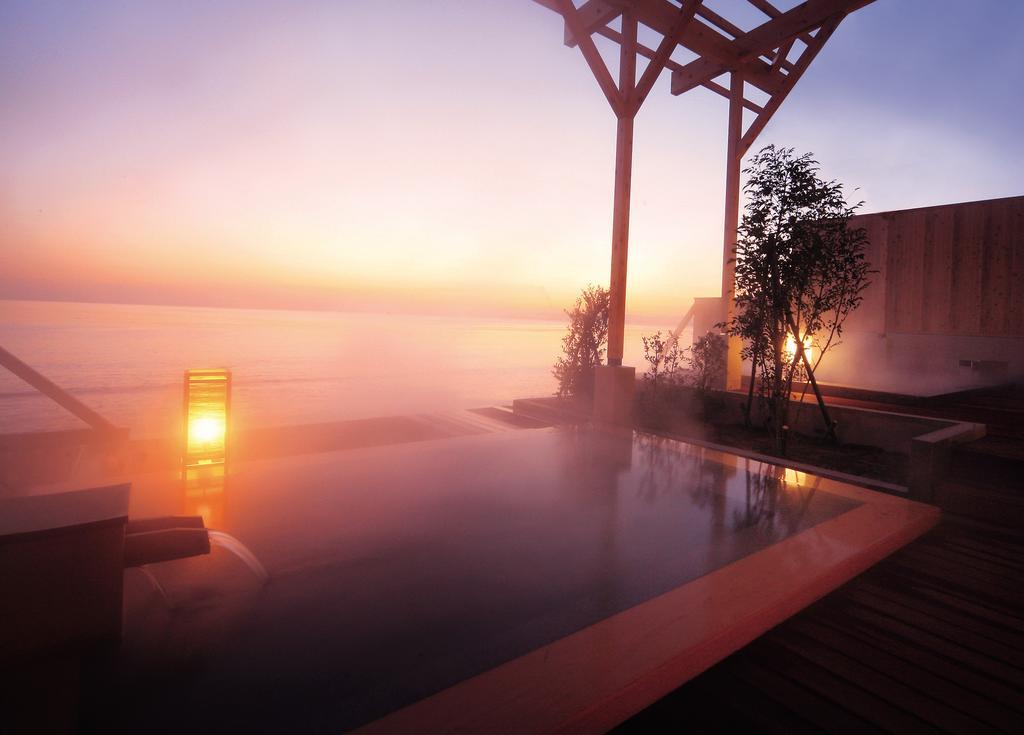Amane Resort Seikai Beppu Exteriér fotografie A view of the outdoor onsen at the Hoshino Resorts Karuizawa Hika