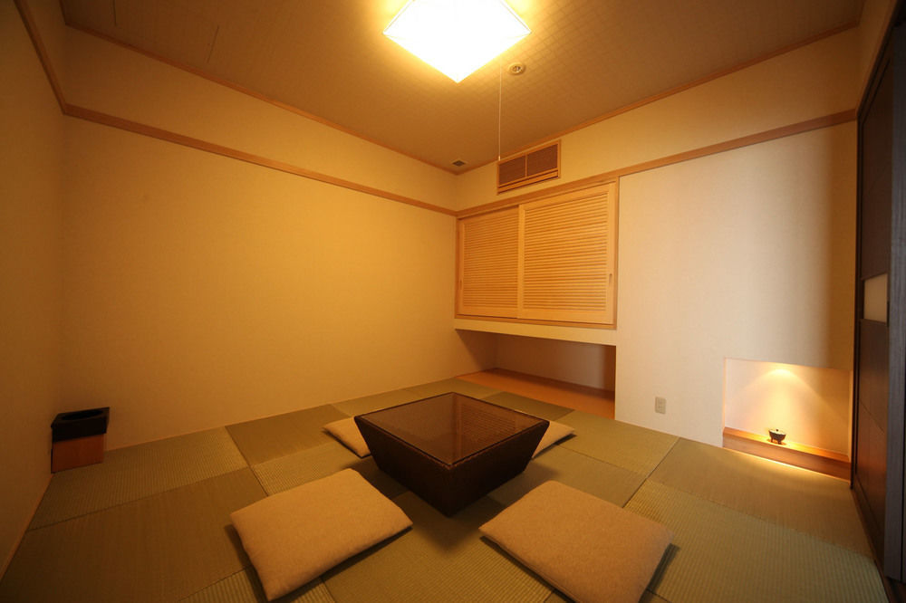 Amane Resort Seikai Beppu Exteriér fotografie A traditional Japanese room with a kotatsu